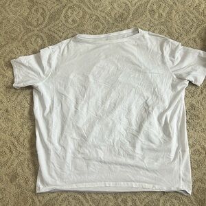 Woman’s over sized white Lulu Lemon t-shirt. like new